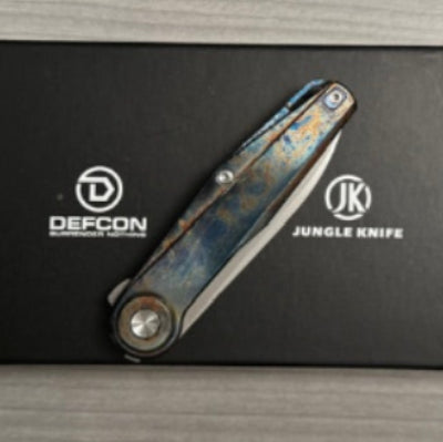 Defcon ~ JK Fulcrum ~ M390/Ti Custom Lightning Anodized 1 of 1