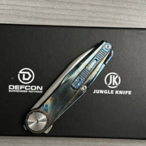 Defcon ~ JK Fulcrum ~ M390/Ti Custom Lightning Anodized 1 of 1
